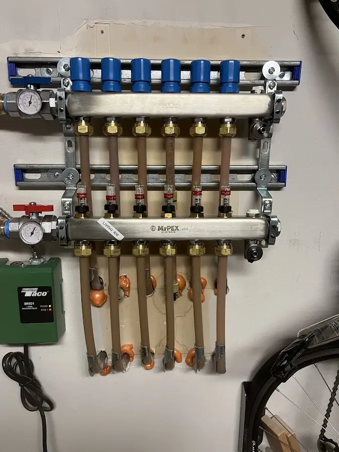 Plumber performing Gas Line Installation at a residential property in Roswell